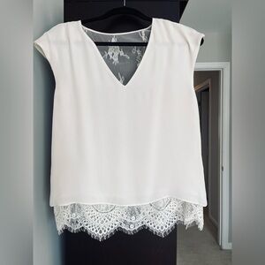 Parker silk blouse with lace accents, and low v-neck back.